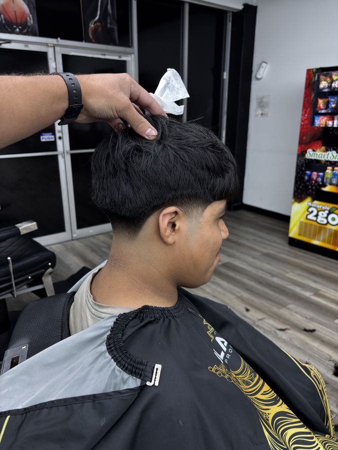 El mismo cliente después del corte, con degradado