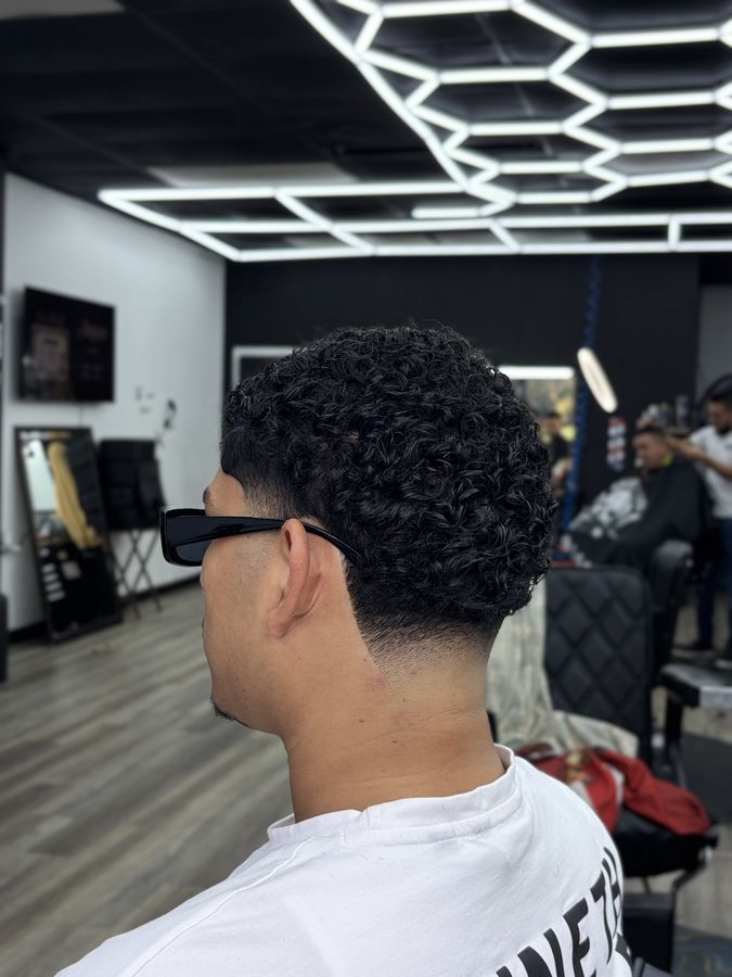 Degradado con rizos hecho por Yan